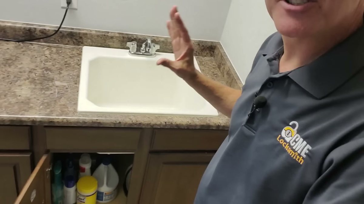 Hiding a safe in the cabinet under a utility sink
